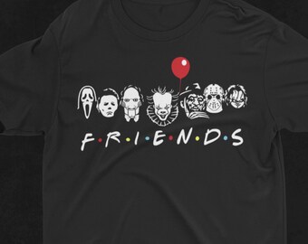 May include: Black t-shirt with a graphic of horror movie characters, including Freddy Krueger, Jason Voorhees, Michael Myers, and Pennywise. The text "FRIENDS" is below the characters.