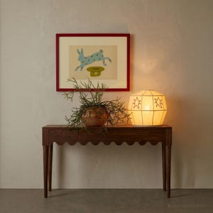 Whimsical blue bunny magic rabbit print displayed in a gallery wall with eclectic maximalist home decor — printable wall art instant download.