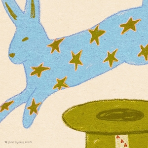Detail shot of olive green magician's top hat with playing card, from hand illustrated magic rabbit folk art print — instant download wall art.