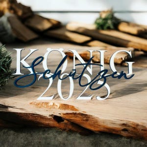 Schützen König 2025 wooden sign – black lacquered with natural lettering. Perfect gift for the Schützenkönig & royal table. 28 cm long.
