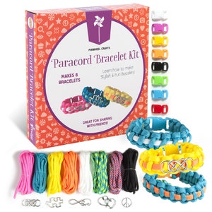 May include: A paracord bracelet kit with eight different colored cords, eight metal clasps, and three metal charms. The box says "Paracord Bracelet Kit" and "Makes 8 Bracelets".