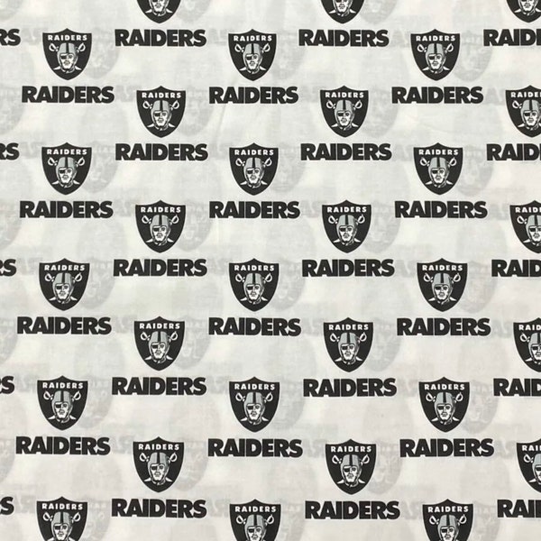 NFL Raiders white licensed 100% cotton fabric sold by the HALF YARD approx 18"x58"