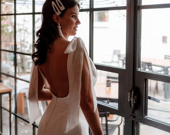 Crepe stretch,  Low back Wedding Dress fishtail made in the U.K.