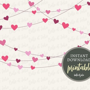 May include: A digital download featuring strings of pink and magenta hearts. The hearts are strung across a cream-coloured background with the text "INSTANT DOWNLOAD printable belle et jolie" in a circular design.