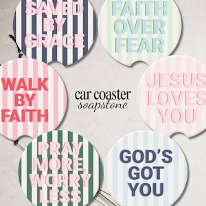 May include: Set of six car coasters with vertical striped patterns in various colors, each featuring a different inspirational phrase in a contrasting color. The phrases include "Saved by Grace," "Faith Over Fear," and "Jesus Loves You."