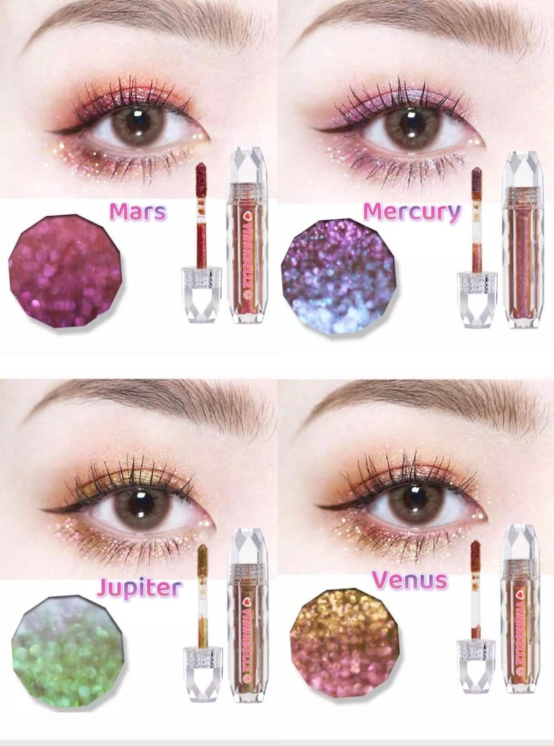 May include: Four different shades of glitter eyeshadow in a crystal-shaped container with a wand applicator. The shades are labeled Mars, Mercury, Jupiter, and Venus.