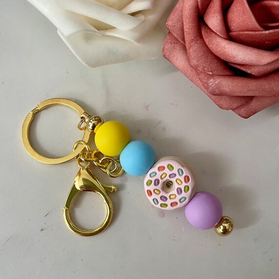 Porte-clés Doré Icing - Neuf Avec étiquettes - Métal Doré - Petit Accessoire Brillant