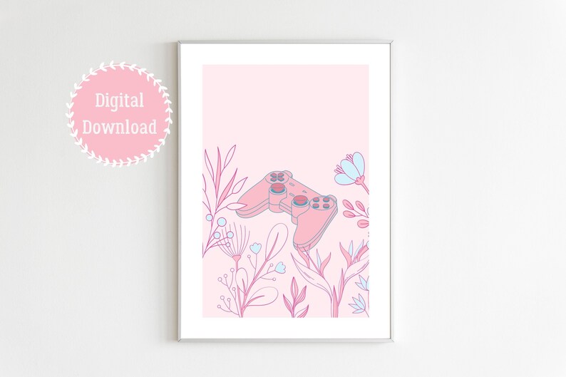 May include: A framed digital print featuring a pink video game controller surrounded by floral illustrations in pink, blue, and purple hues. The words "Digital Download" are in a pink circle in the upper left corner.