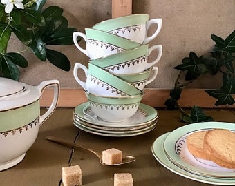Set of 6 vintage cups and saucers in opaque porcelain, green and gold colors, l'Amandinoise St Amand