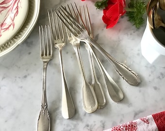 Silverware, 6 mismatched old forks in silver-plated metal, various goldwork