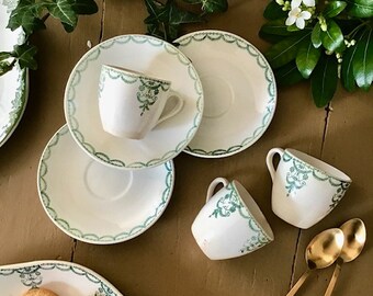 Set of 3 old iron earth cups and saucers decorated with lambrequins and plant frieze, green color, Moulin des Loups.