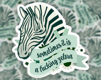 May include: A white sticker with a zebra head illustration and the text "sometimes it is a fucking zebra" on a light green banner. The sticker has a floral design and the website address rosewatercreative.com.