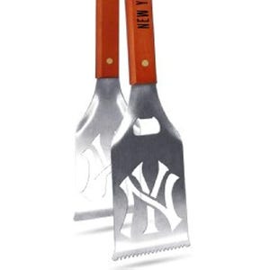 May include: Stainless steel grilling tongs with orange wooden handles. The tongs feature the New York Yankees logo and text. The tongs are designed for grilling and outdoor cooking.