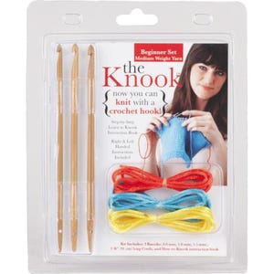May include: A beginner set for The Knook, featuring three bamboo crochet hooks with eyelets, three cords in red, blue, and yellow, and an instruction book. The packaging includes text detailing the 4.0 mm, 5.0 mm, and 5.5 mm hook sizes and 36-inch cords.