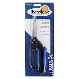 May include: Thornton's Art Supply scissors with a black and blue handle. The scissors are spring-assisted and made of stainless steel. The packaging includes the text "SCISSORS".