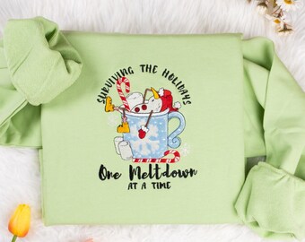 Sudadera navideña bordada con muñeco de nieve: Holiday Meltdown Crew Neck