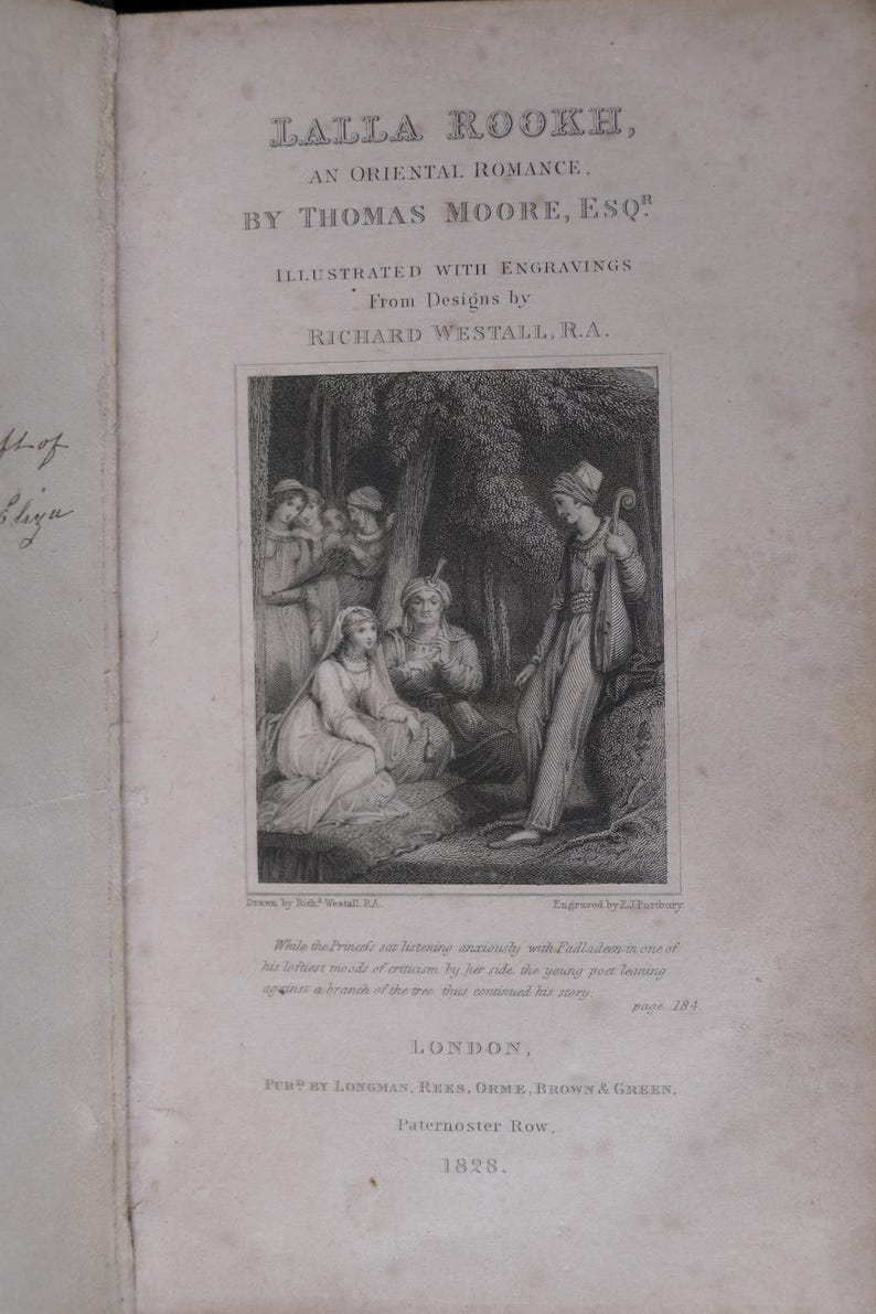 May include: An antique book page featuring the title "Lalla Rookh, An Oriental Romance" by Thomas Moore. The page includes an illustration of a scene with several figures in a forest setting, and text describing the scene and publication details.