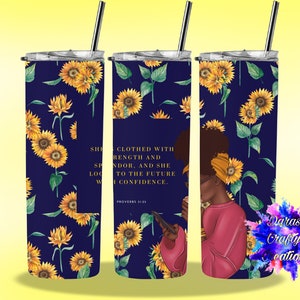 May include: A stainless steel tumbler with a navy blue background and a pattern of yellow sunflowers. The tumbler features a quote from Proverbs 31:25, "She is clothed with strength and dignity, and she laughs without fear of the future."  The tumbler also features a digital illustration of a woman with dark skin, wearing a pink shirt and a sunflower headband, holding a cup of coffee.