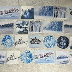 May include: A collage of 20 wintery images featuring snowy landscapes, forests, and cabins. The images are arranged in a grid pattern on a light gray background.