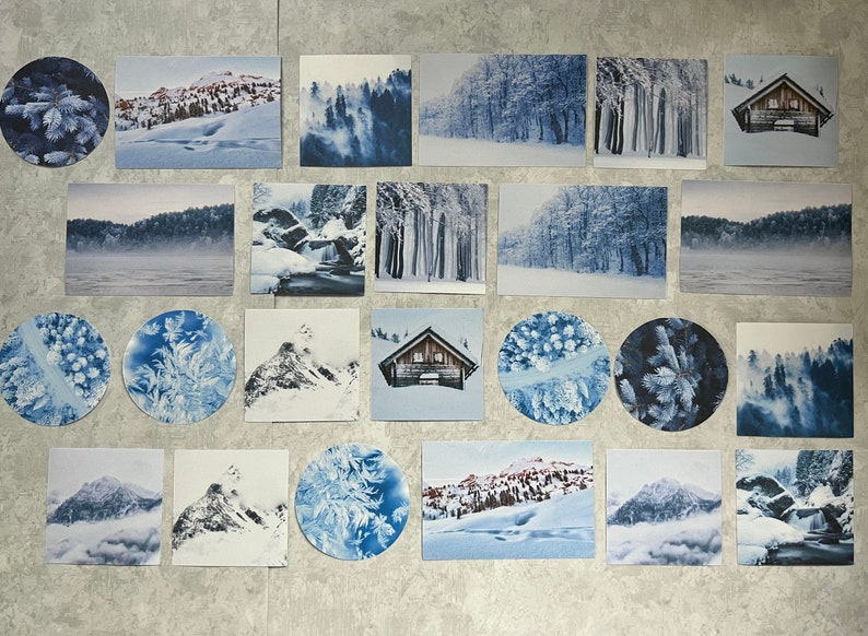 May include: A collage of 20 wintery images featuring snowy landscapes, forests, and cabins. The images are arranged in a grid pattern on a light gray background.