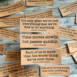 Book quotes by various authors in Kraft brown sticker paper strips.