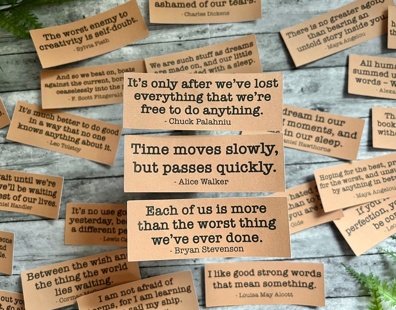 Book quotes by various authors in Kraft brown sticker paper strips.
