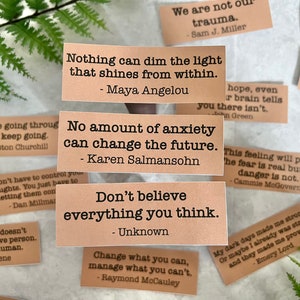 mental health quotes by various authors in kraft brown sticker paper strips.