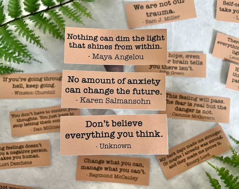 mental health quotes by various authors in kraft brown sticker paper strips.