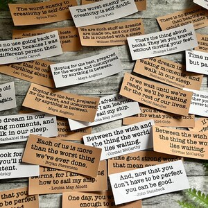 Book quotes by various authors in Kraft brown and white sticker paper strips.