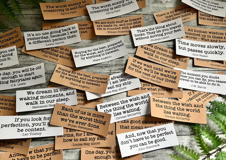Book quotes by various authors in Kraft brown and white sticker paper strips.