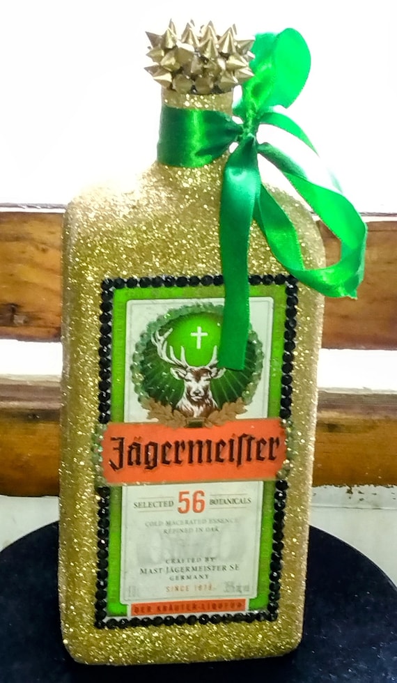Hecho a mano, 'Jagermeister' VACÍO, Botella de licor de 1 litro con brillo  dorado/champán, piedras de cristal negras y verdes, púas doradas -   España