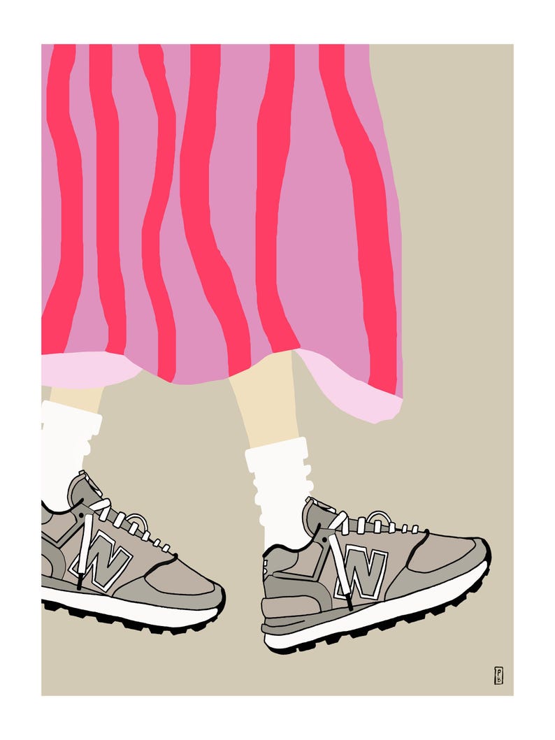 May include: A pair of gray sneakers with white laces and a white "N" logo. The sneakers are worn by a person wearing a pink and white striped skirt.