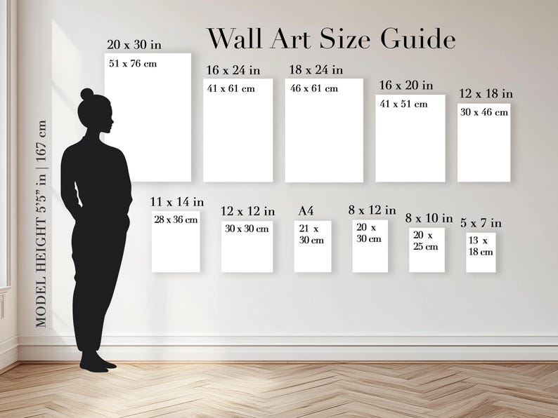 May include: A Wall Art Size Guide chart displaying various rectangular frame dimensions in inches and centimeters. A black silhouette of a person with a height of 5'5" stands next to eleven white rectangles representing different print sizes.