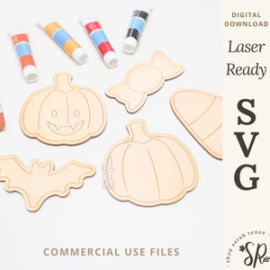 May include: Five wooden Halloween shapes for crafting, including a bat, candy corn, pumpkin, and two pumpkins with different facial expressions. The shapes are laser cut and ready to be painted. The text "COMMERCIAL USE FILES" is at the bottom of the image.
