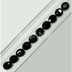 15240.0 - 12x10 mm Oval Cut Australian Opaque Black Sapphires for sale in Various Wholesale Quantities with Volume Discounts