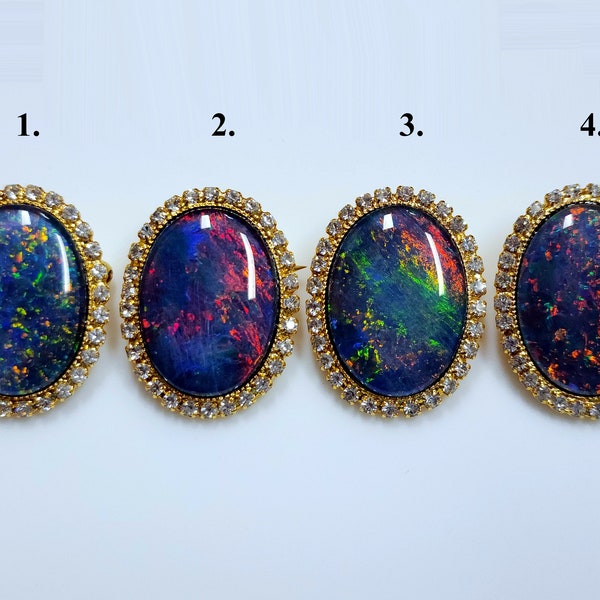53662.0 - Gold Coloured Brooch set with Swarovski Rhinestones Surrounding one Large High Quality 25 x 18 mm Oval Cut Australian Opal Triplet