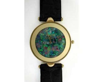 02833.0 - "Faberge" Opal Watch with Natural Australian Opal 31 mm diameter case Total length 22cm Swiss Movement Water resistant No numbers