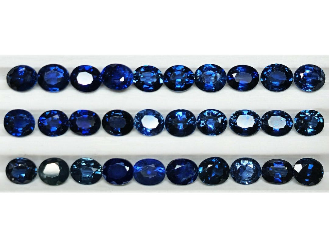 54106. Australian Blue Sapphires: Mixed Oval Cut Gemstone (3.7x3