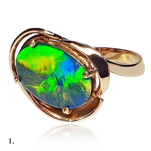 04749.0 - 14 Kt Yellow Gold Ring Set with a 13 x 8 mm (0.51x0.32 inch) Australian Opal Triplet Total weight is approximately 3.8 gr (19 cts)