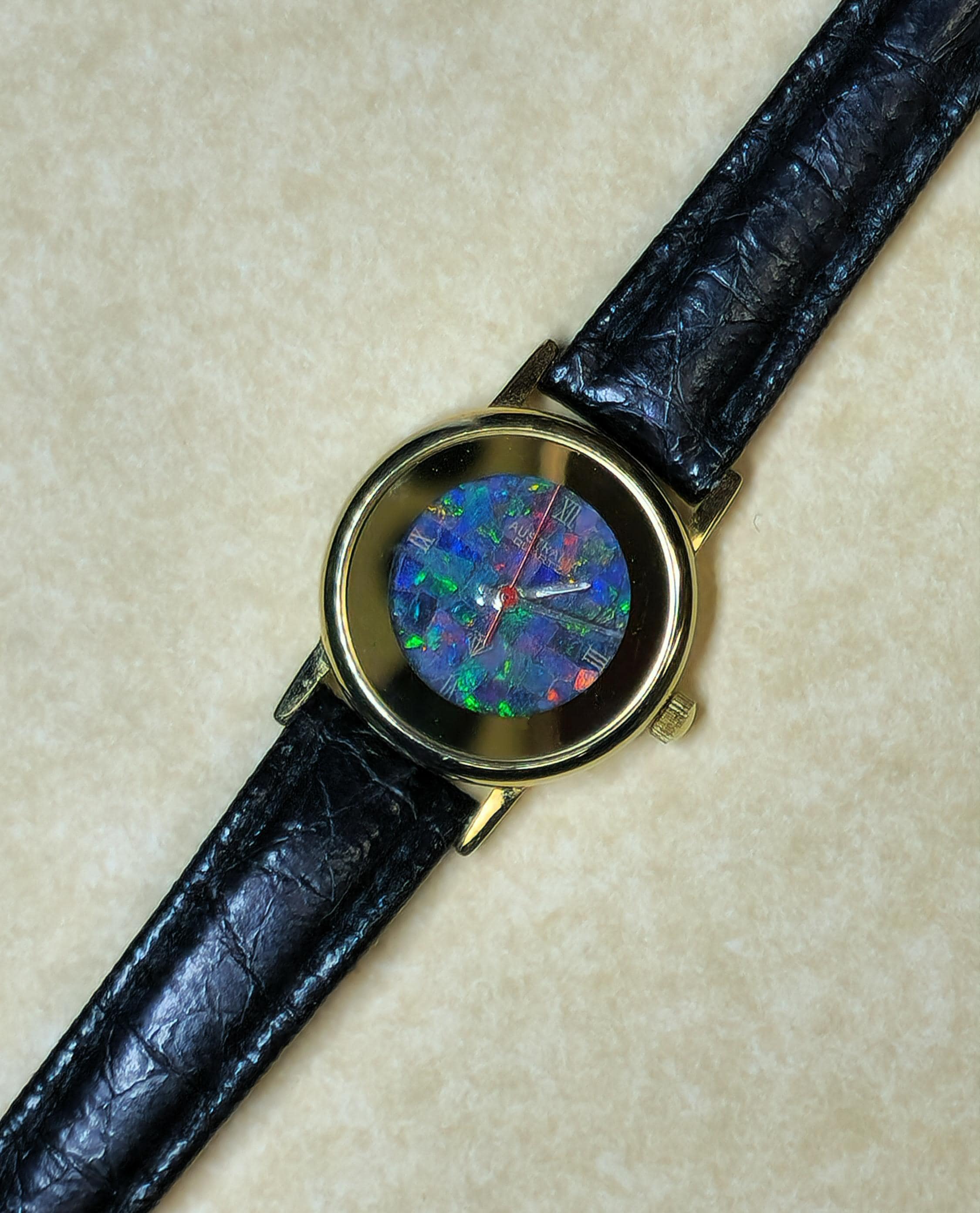 54181.0 - Vintage Australian Opal Watch: Gold Rim, Black Leather