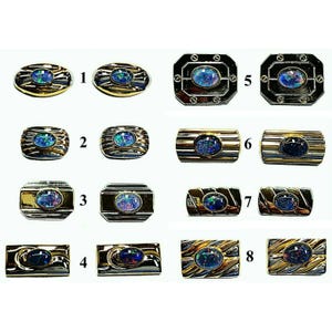 May include: Eight pairs of cufflinks with black opal stones set in gold and silver. The cufflinks are numbered 1 through 8.