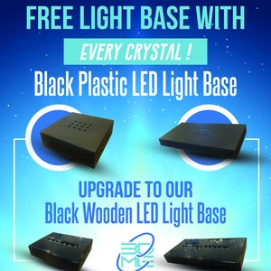 May include: Two black plastic LED light bases and two black wooden LED light bases. The text "FREE LIGHT BASE WITH EVERY CRYSTAL!" and "Black Plastic LED Light Base" are at the top of the image. The text "UPGRADE TO OUR Black Wooden LED Light Base" is in the middle of the image. The text "3D ML" is at the bottom of the image.