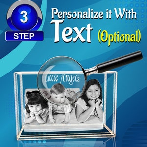 May include: A clear acrylic box with a photo of three children inside. The photo is in black and white and the children are smiling. The box is on a blue background with the text "Personalize it with Text (Optional)" and a magnifying glass over the text "Little Angels" in the photo.