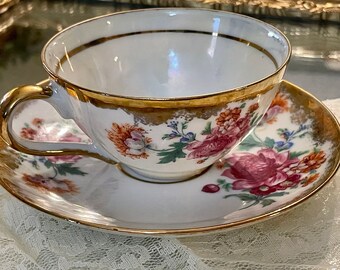 Vintage Floral Tea Cup and Saucer Set: Pink, Gold, and White