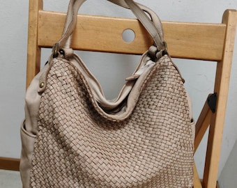 Borsa a mano in pelle intrecciata Borsa a tracolla in pelle intrecciata due scomparti separati con cerniera Siena