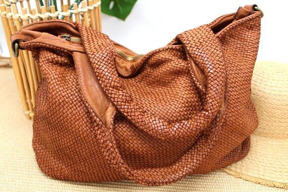 tan woven leather bag