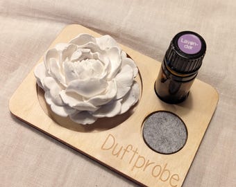 Presentation element for essential oils with fragrance stone
