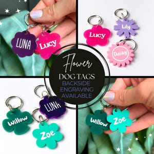 May include: A collage of flower-shaped dog tags in various colors, including purple, pink, green, and teal. Each tag features a different name in white lettering: Luna, Lucy, Lily, Daisy, Willow, and Zoe. The image also includes the text "Flower DOG TAGS BACKSIDE ENGRAVING AVAILABLE."
