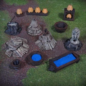 May include: A selection of miniature fantasy terrain pieces, including beehives, tree stumps, a well, and a statue. The pieces are painted in shades of brown, grey, and blue, and are arranged on a green surface.
