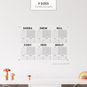 May include: Clear acrylic family chore chart with six columns for names and daily, weekly, and monthly tasks. The chart is shown in a 20"x14" size. The top of the chart has the text "9 SIZES" and "3 hardware color options".